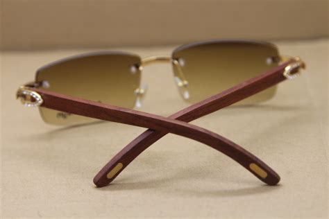 cartier rimless wood frame glasses.